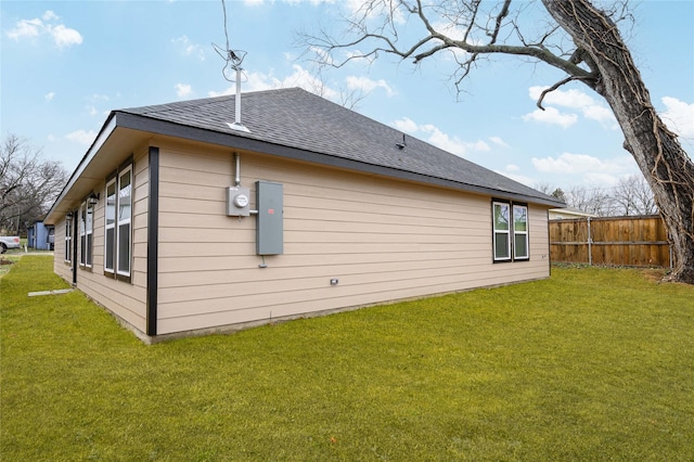 view of property exterior featuring a lawn