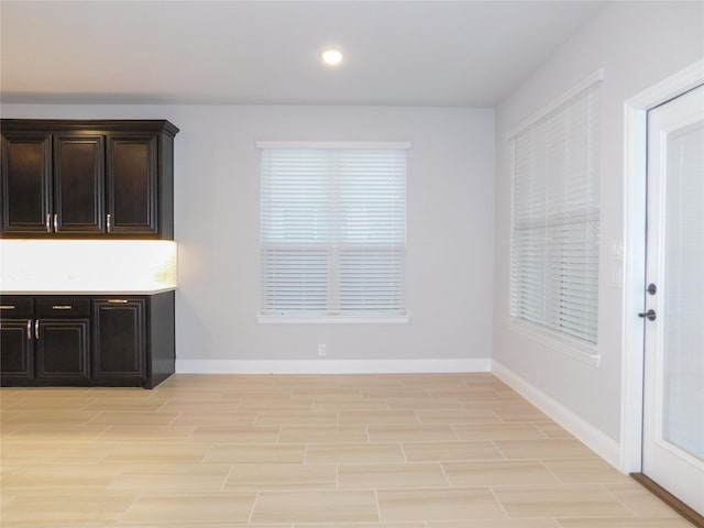 unfurnished dining area featuring light hardwood / wood-style floors