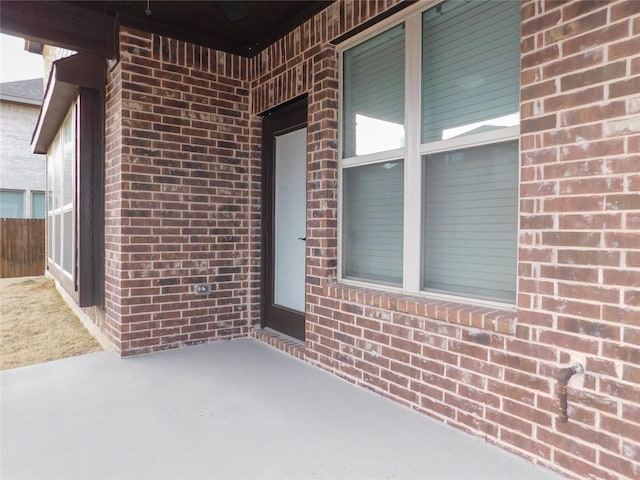 doorway to property featuring a patio