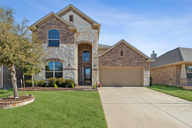 view of front of home featuring a garage and a front lawn