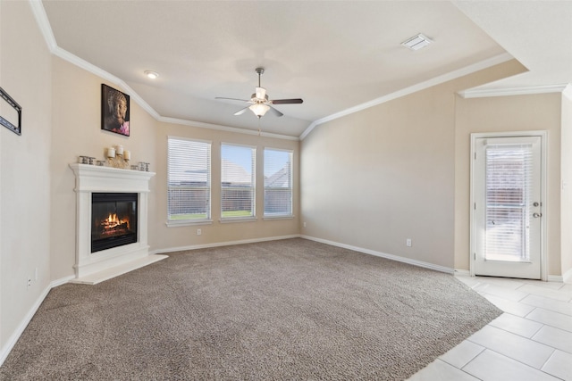 unfurnished living room with crown molding, ceiling fan, a healthy amount of sunlight, and light tile patterned flooring