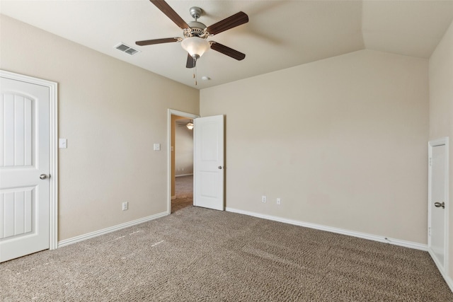 unfurnished bedroom featuring lofted ceiling, ceiling fan, and carpet