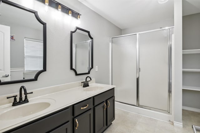 bathroom with vanity and an enclosed shower