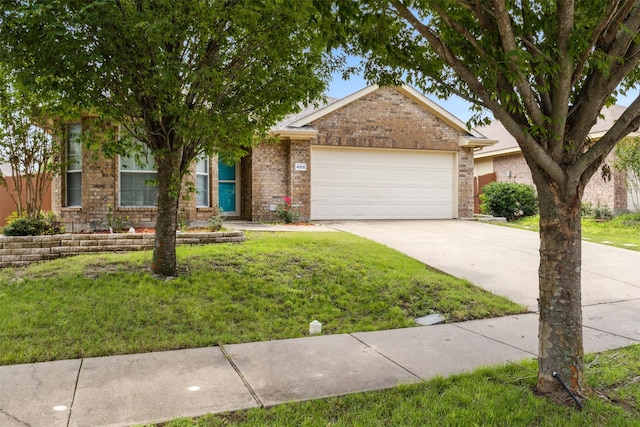 view of front facade with a garage and a front lawn