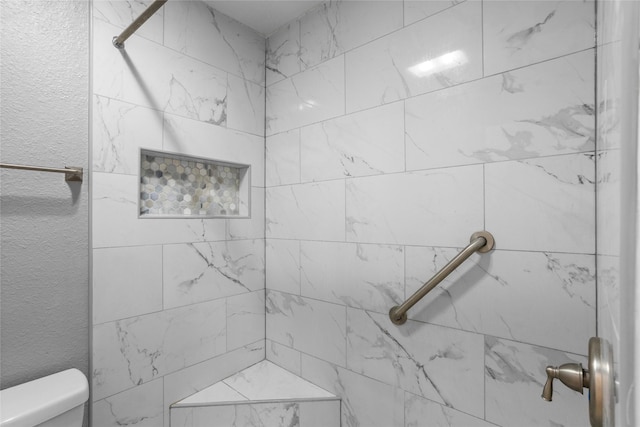 6329 Peggy Dr, Fort Worth, TX 76133 - full bathroom with toilet, a textured wall, and tiled shower