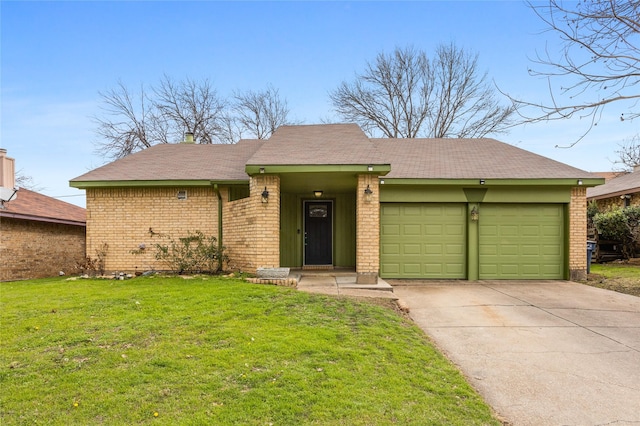 ranch-style home featuring a garage and a front yard