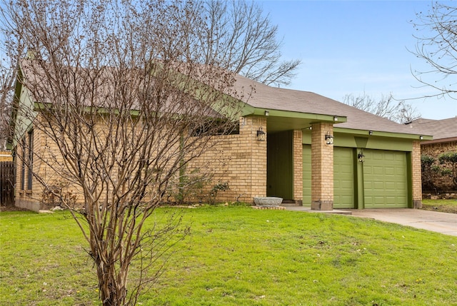 ranch-style home with a garage and a front yard