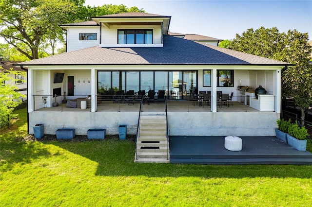 201 Seaside Dr, Gun Barrel City, TX 75156 - rear view of property featuring roof with shingles and a lawn