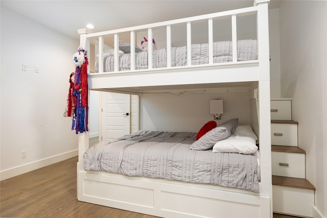201 Seaside Dr, Gun Barrel City, TX 75156 - bedroom with recessed lighting, baseboards, and wood finished floors