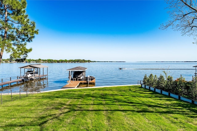 201 Seaside Dr, Gun Barrel City, TX 75156 - view of dock featuring boat lift, a water view, and a lawn