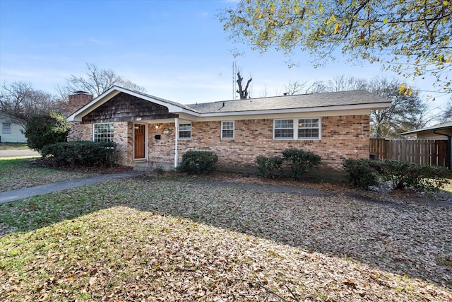 ranch-style house with a front yard