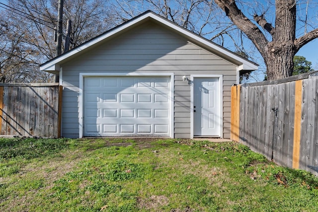 garage with a lawn