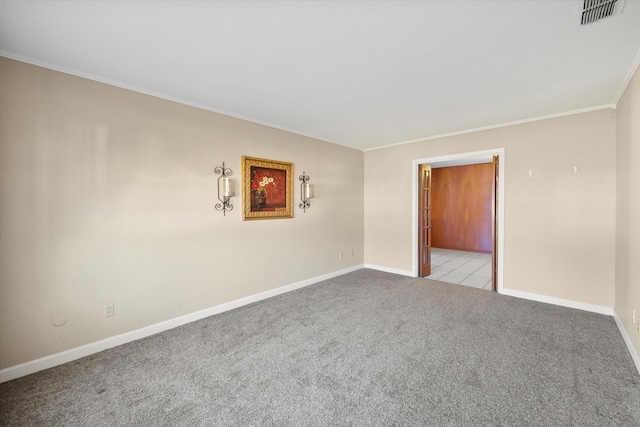 unfurnished room with crown molding and light carpet