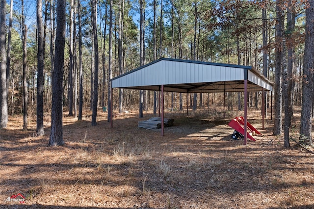 exterior space with a carport