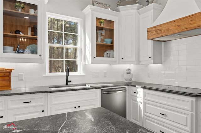 kitchen with white cabinetry, sink, custom range hood, and dishwasher