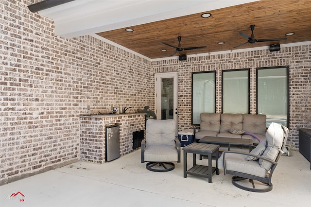 view of patio / terrace featuring outdoor lounge area and ceiling fan