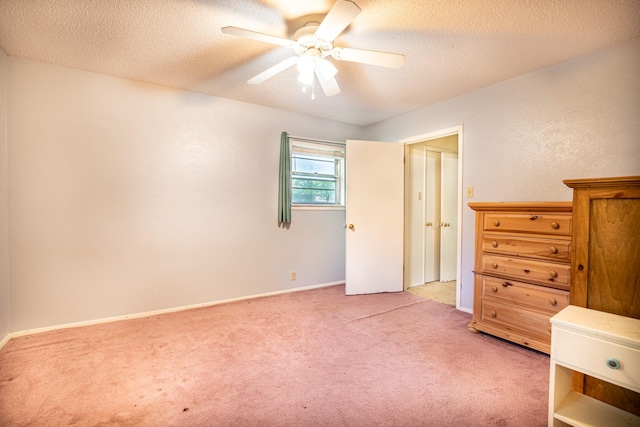 1225 Crestwood Dr, Cleburne, TX 76033 - bedroom with light carpet, ceiling fan, and a textured ceiling