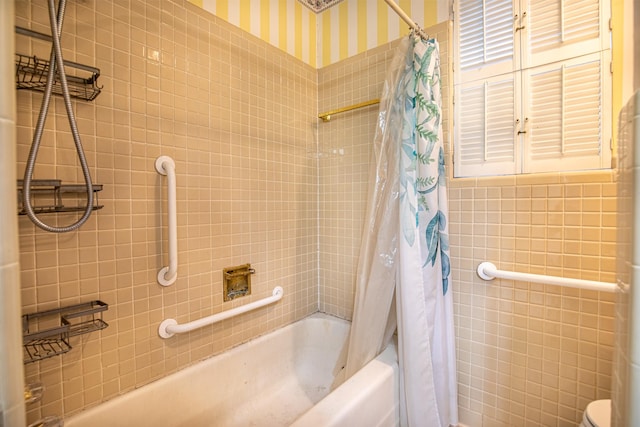 1225 Crestwood Dr, Cleburne, TX 76033 - bathroom featuring shower / bath combo with shower curtain