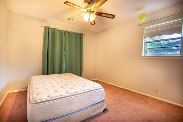 1225 Crestwood Dr, Cleburne, TX 76033 - bedroom featuring baseboards, a ceiling fan, and carpet floors