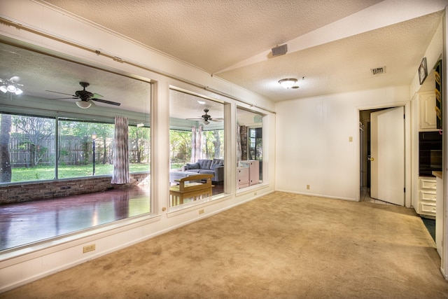 1225 Crestwood Dr, Cleburne, TX 76033 - interior space with a textured ceiling, ceiling fan, baseboards, and light carpet