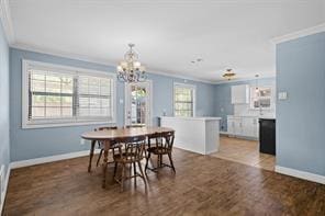 dining space featuring ornamental molding