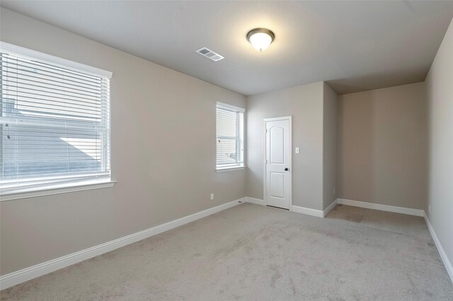 view of carpeted spare room