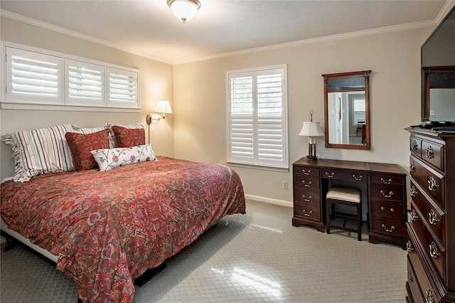 bedroom featuring ornamental molding and carpet flooring