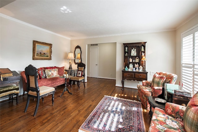 living room with crown molding and dark hardwood / wood-style floors