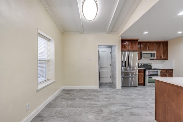 kitchen with ornamental molding, appliances with stainless steel finishes, and beam ceiling