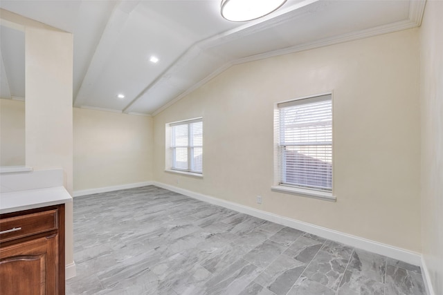 unfurnished living room featuring vaulted ceiling