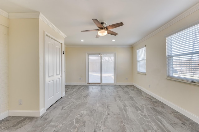 unfurnished room with ornamental molding and ceiling fan