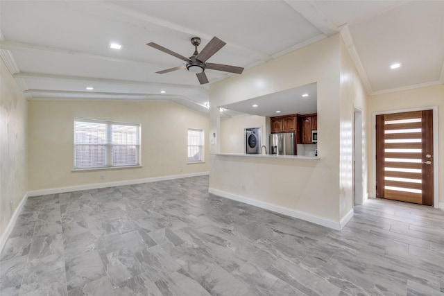 unfurnished living room with vaulted ceiling, ornamental molding, and ceiling fan