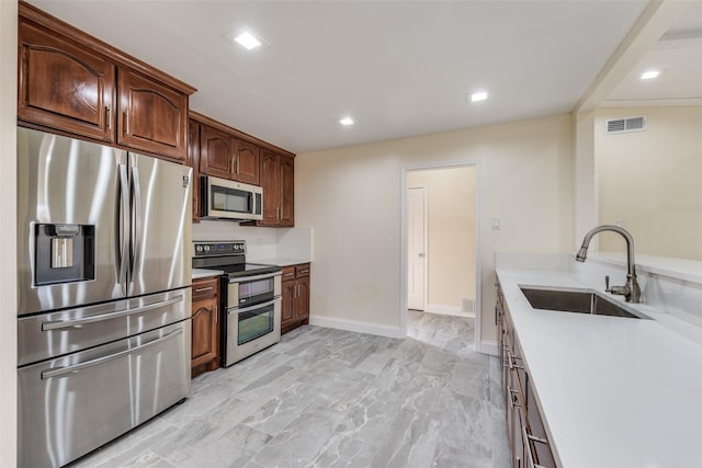 kitchen featuring sink and stainless steel appliances