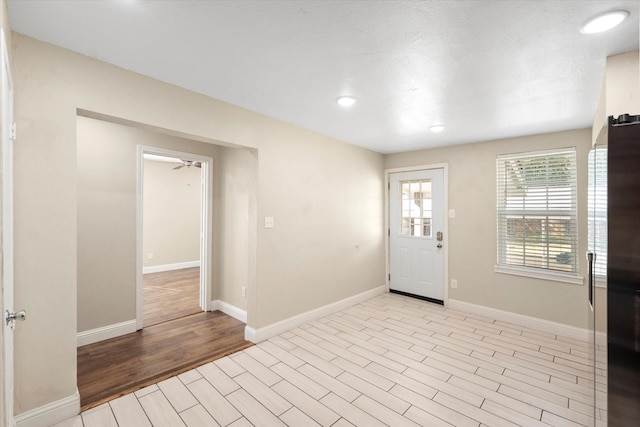 foyer entrance featuring light hardwood / wood-style floors