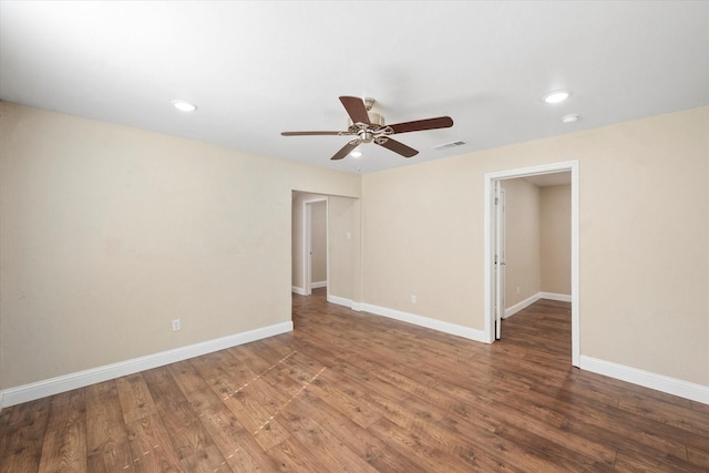 unfurnished room with hardwood / wood-style flooring and ceiling fan