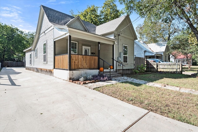 bungalow-style house featuring a front yard and a porch