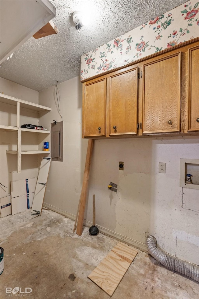 laundry area with cabinets, a textured ceiling, electric panel, washer hookup, and hookup for an electric dryer