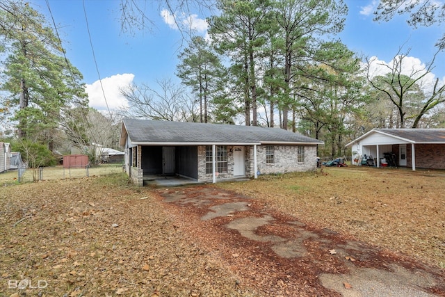 exterior space with a carport