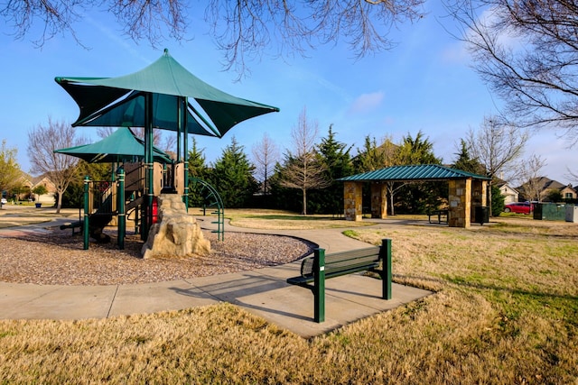 view of playground featuring a lawn