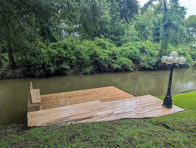 view of dock with a water view