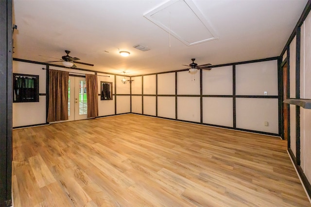 spare room with ceiling fan and light hardwood / wood-style flooring