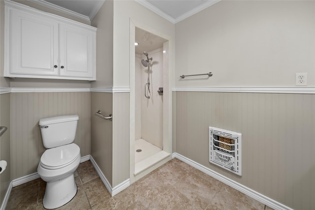 bathroom featuring crown molding, tile patterned flooring, heating unit, a shower, and toilet