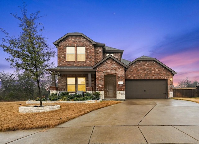 view of front of property with a garage