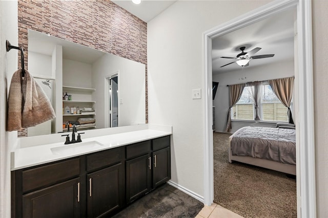 bathroom featuring vanity, tile patterned floors, and ceiling fan