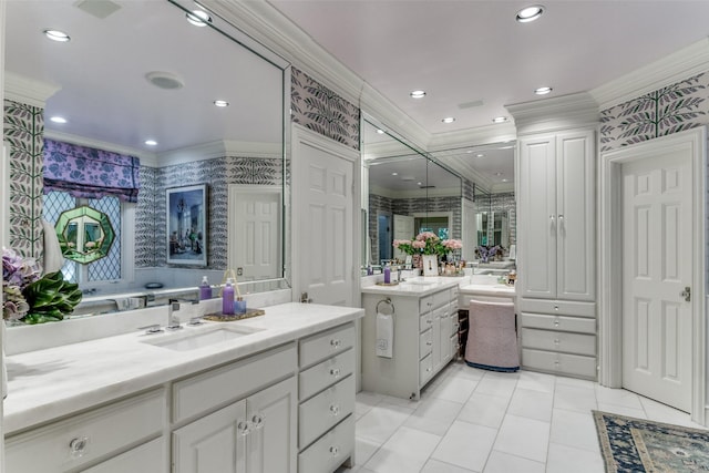 bathroom featuring crown molding, vanity, and tile patterned flooring