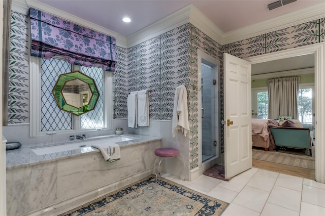 bathroom featuring tile patterned flooring, crown molding, and independent shower and bath