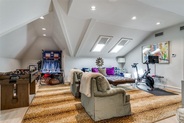 interior space featuring vaulted ceiling and light wood-type flooring