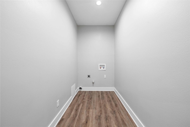 laundry room featuring hookup for a washing machine, hookup for an electric dryer, and hardwood / wood-style flooring