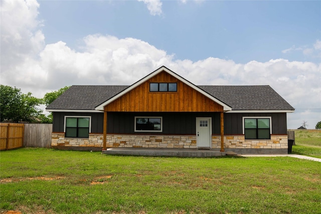 view of front of home with a front lawn