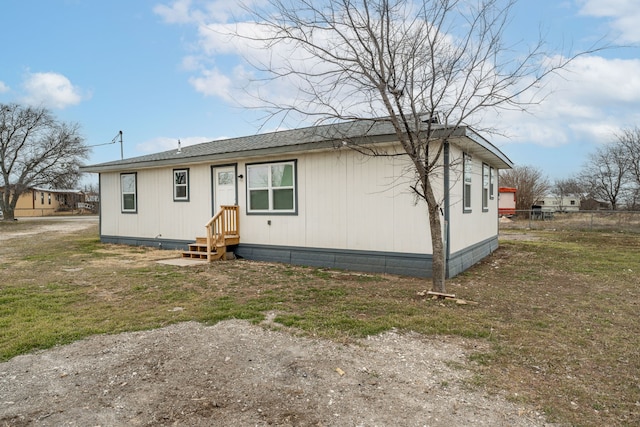 view of front of home with a front yard